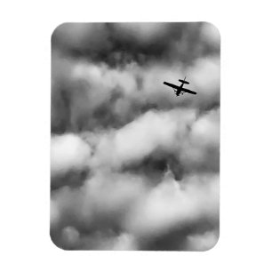 Magnet Flexible Petit avion volant dans un ciel nuageux Photo