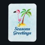 Magnet Flexible Seasons Greetings Pink Flamingo in Santa Hat<br><div class="desc">Festive christmas flex-magnet with the text: Seasons Greetings. A whimsical drawing of a pink flamingo wearing a red santa hat. Standing on a mound of yellow beach sand with a green and brown coconut palm tree in the back.  Light blue background. Cute and fun festive tropical design.</div>