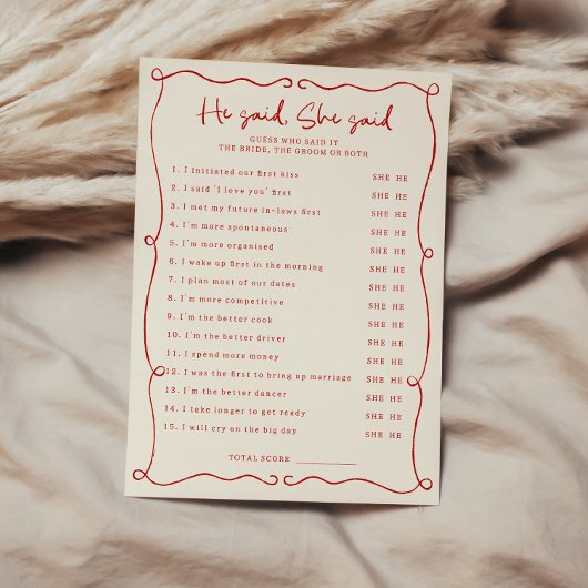 Main rouge tiré Il dit qu'elle dit carte de Fête d