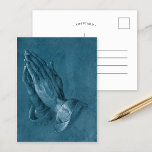 Mains de prière | Carte postale Albrecht Dürer<br><div class="desc">Praying Hands (1508), également connu sous le nom d'Study of the Hands of an Apostle, est un dessin stylo-encre de l'artiste allemand Albrecht Dürer. L'oeuvre originale a été créée à l'aide de la technique du blanchiment blanc et de l'encre noire sur du papier de couleur bleue. Le dessin montre un...</div>