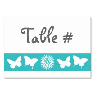 Maisonnettes et papillons sur carte de table Turqu