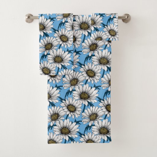 Maisonnettes, fleurs sauvages sur bleu (En situation)