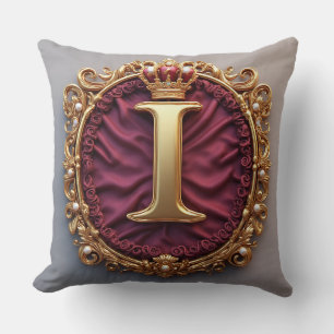 Majestueus gouden monogram met kroon op koninklijk kussen