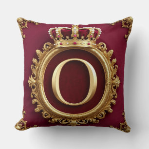 Majestueus gouden monogram met kroon op koninklijk kussen