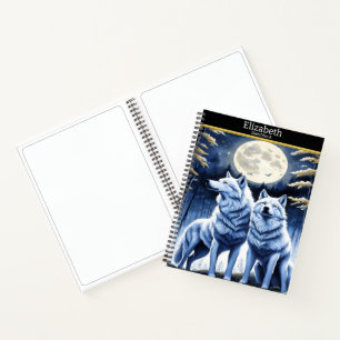 Majestueuze wolven huilen onder het licht van de m notitieboek