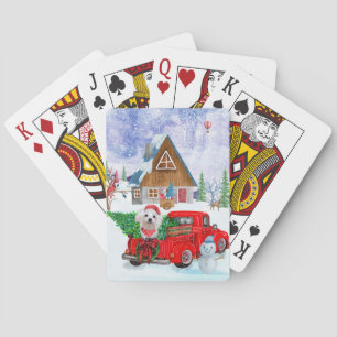 Maltese hond in kerstcadeauwagen pokerkaarten