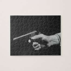 Man Holding Pistool Legpuzzel