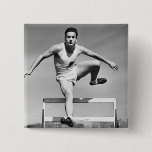 Man Hurdling Vierkante Button 5,1 Cm