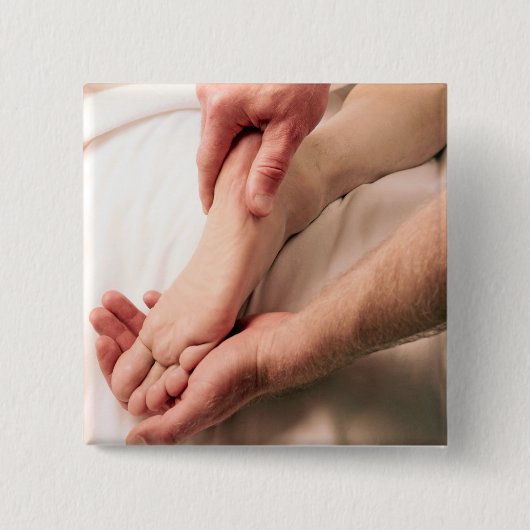 Man Massaging Male Foot Vierkante Button 5,1 Cm (Voorkant)