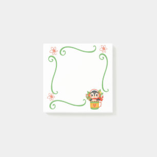Manchot de Noël dans des Post-It de tasse