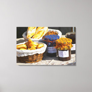 Mand met croissants en chocoladebroden. canvas afdruk