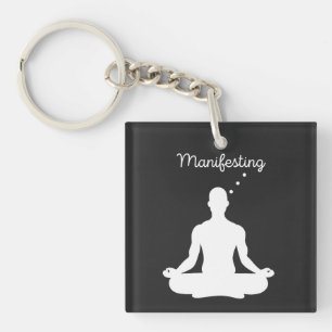 Manifesteren van visuele meditatie voor positieve sleutelhanger