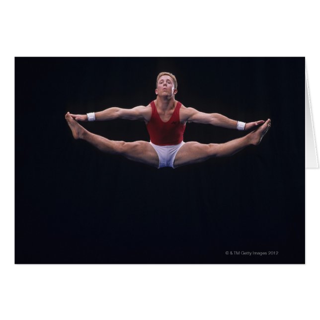 Mannelijke gymnast die op de vloer werkt (Voorkant Horizontaal)