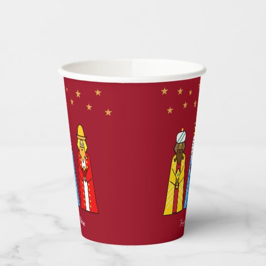 Mannen met kerstmis en gouden sterren op rood papieren bekers (Links)