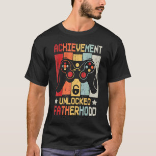 Mannen prestatie onvergrendelde videogames uit de t-shirt