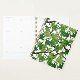 Maple leaves on black planner