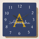 Marine Blue Gold Script Monogramme Nom de la fille<br><div class="desc">Monographie de script bleu or et marine Monogramme Nom Horloge. Cela rend le cadeau parfait pour 16 ans,  mariage,  douche nuptiale,  anniversaire,  baby shower ou bachelorette pour quelqu'un qui aime le luxe glam et les styles chic.</div>