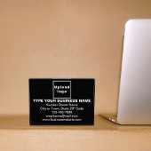 Marque d'entreprise sur bloc photo rectangle noir