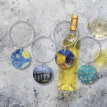 Marque-verres Vincent van Gogh Peintures chefs-d'oeuvre<br><div class="desc">Un ensemble de marque - verres avec des paysages de Vincent van Gogh (1853-1890) un artiste néerlandais,  dont Starry Night (1889),  Starry Night over the Rhone (1888),  Cafe Terrace (1888) et Blossoming Almond Tree (1890),  quelques uns ses peintures les plus connues.</div>