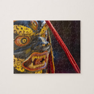Maskerdansuitvoering op het Tshechu-festival Legpuzzel
