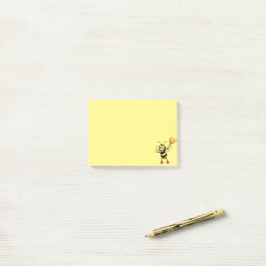 Matig schattige honingbij op geel post-it® notes (Op bureau)