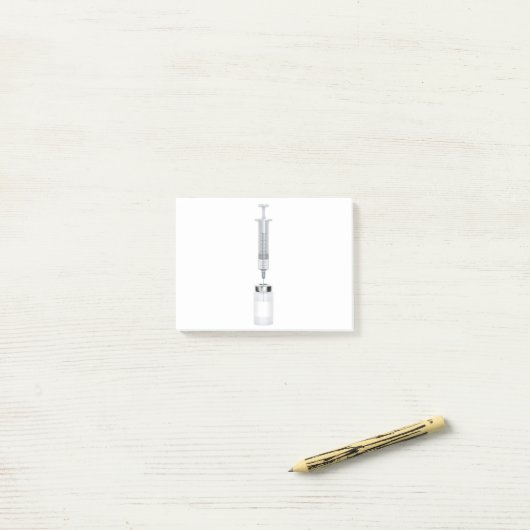 Medische injectieflacon en spuit post-it® notes (Op bureau)