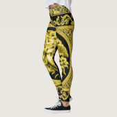 Méduse dorée avec arabesques sur leggings noirs (Gauche)