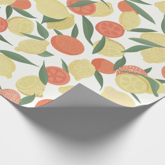 Meel en sinaasappel vruchten met bladeren op witte cadeaupapier (Hoek)