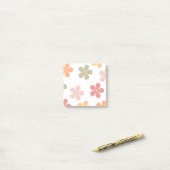 Meerkleurige bloemen post-it® notes (Op bureau)