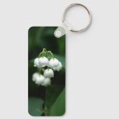 Mei witte lileugen sleutelhanger (Achterkant)