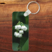 Mei witte lileugen sleutelhanger (Achterkant)