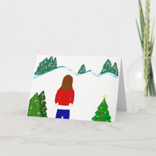 Meisje dat besneeuwde bergen bekijkt feestdagen kaart