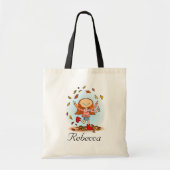 Meisje dat in bladeren speelt, herfst bibliotheekt tote bag (Voorkant)