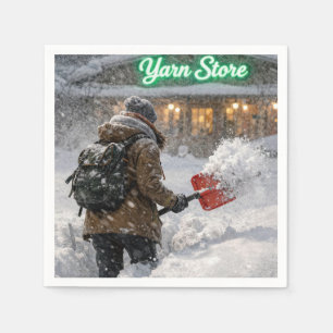 Meisje dat sneeuw schept naar een garenwinkel servet