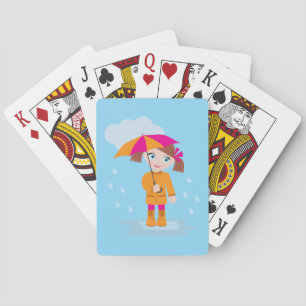 Meisje in oranje regenjas met roze paraplu pokerkaarten