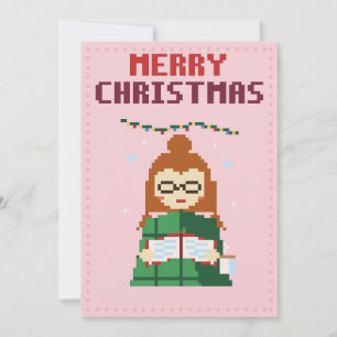 Meisje leest roze pixelart kerstkaart