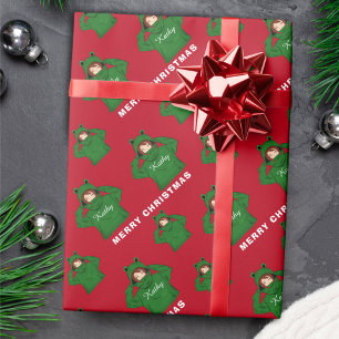 Meisje met groene kikker hoodie die kerst tekenen cadeaupapier