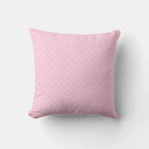 Meisjesachtige kleine witte stippen op roze kussen