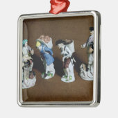 meissen:zadelaar,geitenverkoper metalen ornament (Links)