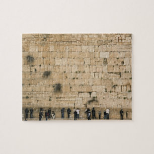 Mensen bidden bij de klaagmuur legpuzzel