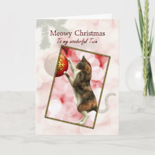 Meowy Kerstmis met een speelse kat. Feestdagen Kaart
