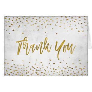 Merci avec des confettis de coeurs de feuille d'or