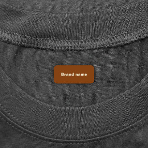 Merknaam op label met etiket met handdoek in bruin