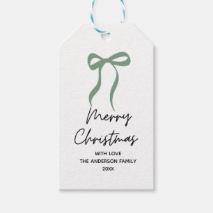 Met de hand getekende groene strik vrolijk kerstfe cadeaulabel