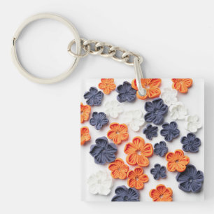 Met de lente vervaardigde plantenslijmen oranje bl sleutelhanger