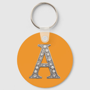 Met juwelen bezette letter A op gele achtergrond Sleutelhanger