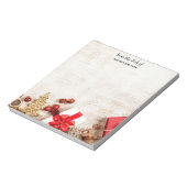 Met kerstmis behandelde items op een Rustige Woode Notitieblok (Gedraaid)