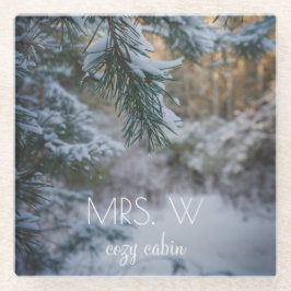 Met sneeuw bedekte grenentakken glazen onderzetter