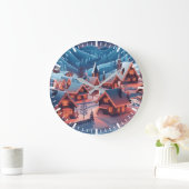 Met sneeuw bedekte huizen met kerstverlichting grote klok (Huis)