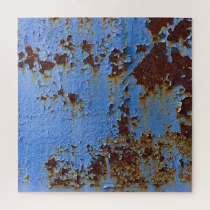 Metaal en blauwe verf textuur. legpuzzel